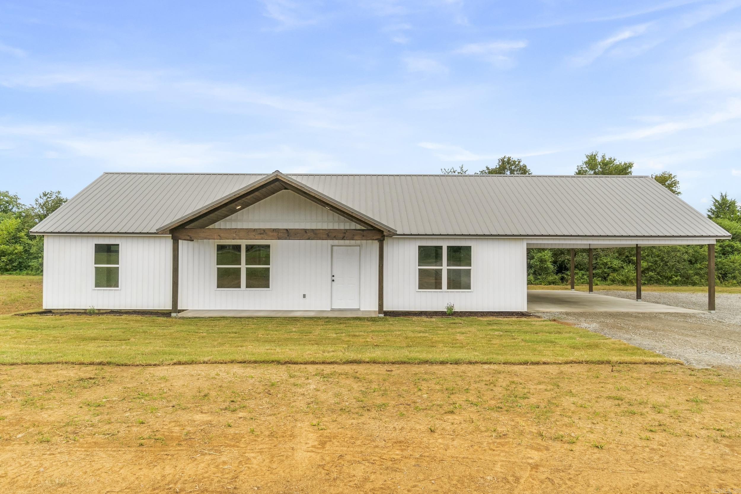 Welcome to the country retreat youāve been waiting for! This brand-new rustic home sits on 8 acres and captures the perfect blend of space, privacy, and functionality. Inside, the open-concept kitchen features a large island, sleek appliances, abundant storage, and a pantryāideal for both everyday living and hosting family and friends! The spacious living room is highlighted by a beautiful tongue-and-groove ceiling, giving the home warmth throughout. With 3 bedrooms and 2 bathrooms, the primary suite stands out with its oversized closet with lots of shelving and private bath, offering a peaceful escape at the end of the day. Outside, relax or entertain on the expansive covered patio with striking wooden posts, or take advantage of the massive carport for all your car storage needs! This back patio area is the one you dream about! Complete with a metal roof and surrounded by wide-open land, this home offers the lifestyle, comfort, and beauty of country livingājust waiting for you! Roughly 5-minute drive to Rose Bud Schools! Outside of city limits with no restrictions! Insulation and heat/air have a high energy efficiency rating! 15 min from Searcy or Heber! MUST SEE!