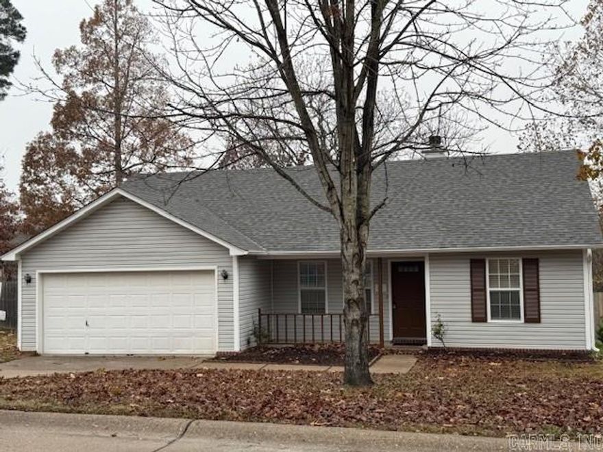 A well designed plan and lots of thoughtful updates in this 3 BR, 2 Bath home make it one you don't want to miss.  From new paint inside and out & newer roof and appliances add to the "like new" feeling. The LR with FP has a vaulted ceiling that extends this area's atmosphere. The kitchen with white cabinets (refrigerator stays) and dining area are sure to be a favorite gathering place for the family.  Kitchen also has a gas hook up if needed. A separate large pantry and laundry room is complete with washer and electric dryer that remains.  The separate BR plan includes a large primary suite with twin sinks, a whirlpool tub and separate shower and two walk in closets.  A 2-car garage and a backyard with large two tier deck and privacy fencing finish the outside.  This home includes school choice Benton or Bryant.