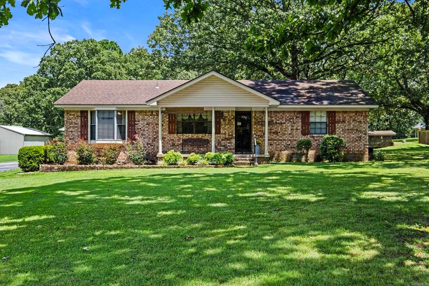 An EyeCatcher!  This property has all kinds of curb appeal!  3 bdrm 2 bath home with 1500 sq ft of efficiency.  Pull into this long driveway and park in the back of the home under the carport of pull directly into a shop.  There are several other outbuildings for your toys, gardening tools or just storage.  The large shade trees and the manicured yard makes this property desirable property in my book!  The inside of the home is very clean.  This is a great starter home or for anyone down sizing.  Don't let this one slip away.   Roof is approx 10 yrs old, HVAC is approx 10 years old New water heater.