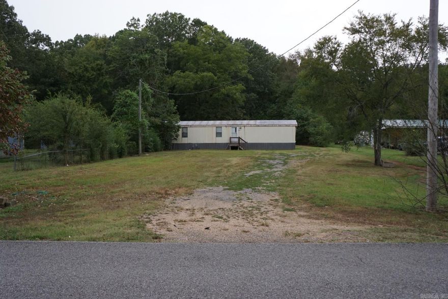 Discover a fantastic investment opportunity just outside Conway city limits! This charming 3-bedroom, 2-bath manufactured home sits on approximately 0.52 acres, offering plenty of potential. With some TLC, this property could be transformed into a cozy haven or a lucrative rental. Don't miss your chance to expand your real estate portfolio—schedule a showing today and envision the possibilities!  *See agent remarks*
