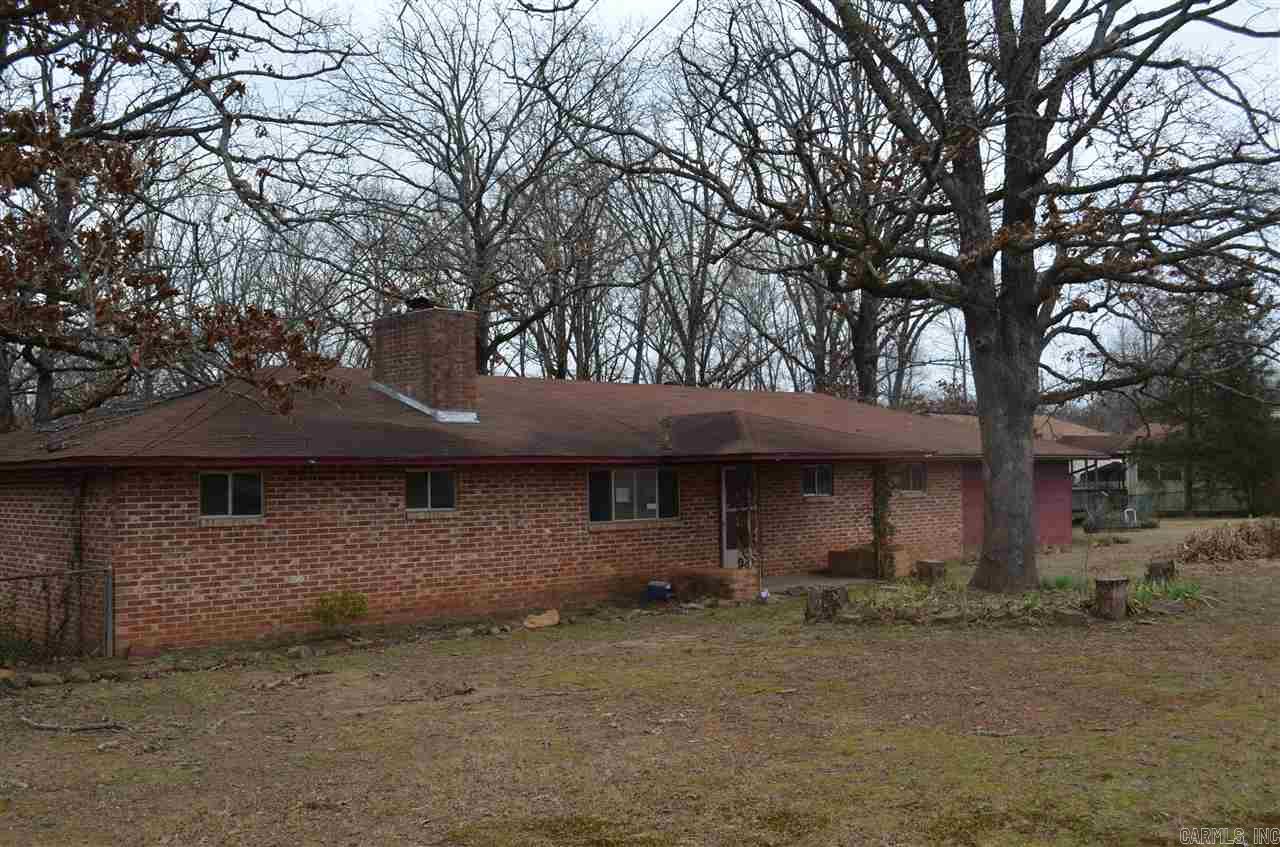 Jacksonville-- Bank foreclosure sold "AS IS." 5 Bedrooms or 4 Bedroom and office, 1.5 bath, spacious den with fireplace, living room and eat-in kitchen. Large over sized lot with easy freeway access.