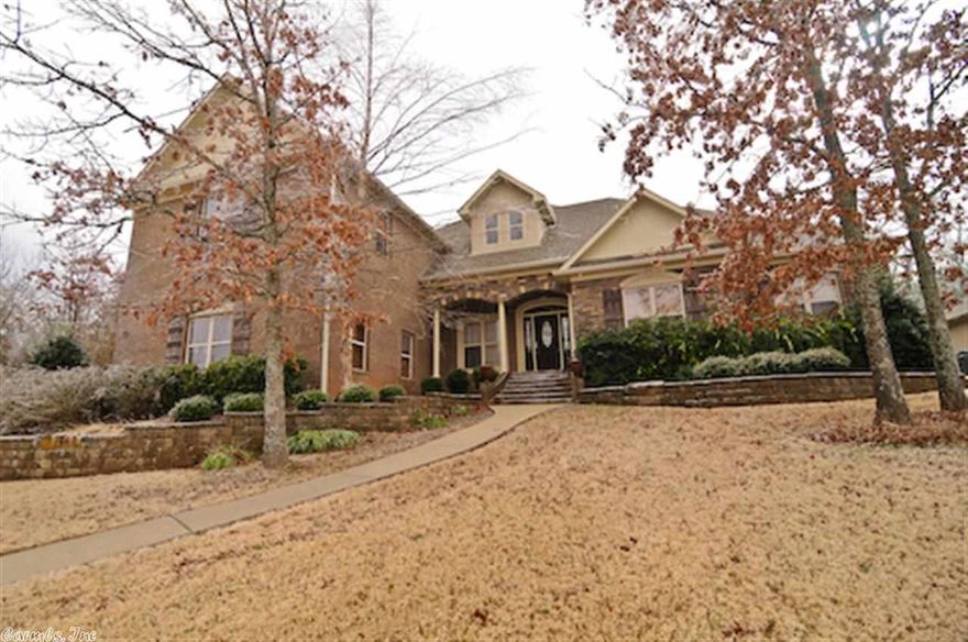 Beautiful 4BR, 3.5BA home w/3 fp (one in master) 16 ft & 20 ft trey ceilings, hardwood flooring, beautiful cabinet w/corain counter tops  & tiled back splash, breakfast bar kitchen/den fireplace & built in desk. Full baths all have double vanities, master has huge shower, huge walk-in closets. Very large bonus room upstairs makes excellent game room or could be 5th bedroom (has a half bath). 2nd bedroom has its bath/great for guest or in laws. Much much more! Must see.