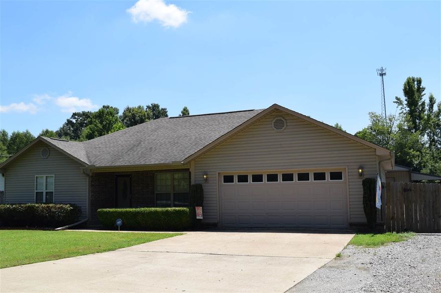 Beautiful and move-in ready home with open floor plan, large kitchen/dining room with ceramic tile, stainless appliances, tons of counter space in the kitchen, Pella storm doors, fenced in backyard. The backyard features the shop of your dreams!  The 30x30 structure has propane heat, 10x30 porch with ceiling fans, 30x12 lean to, wired for A/C, extra insulation in ceiling and walls.  Call to see this amazing property today!