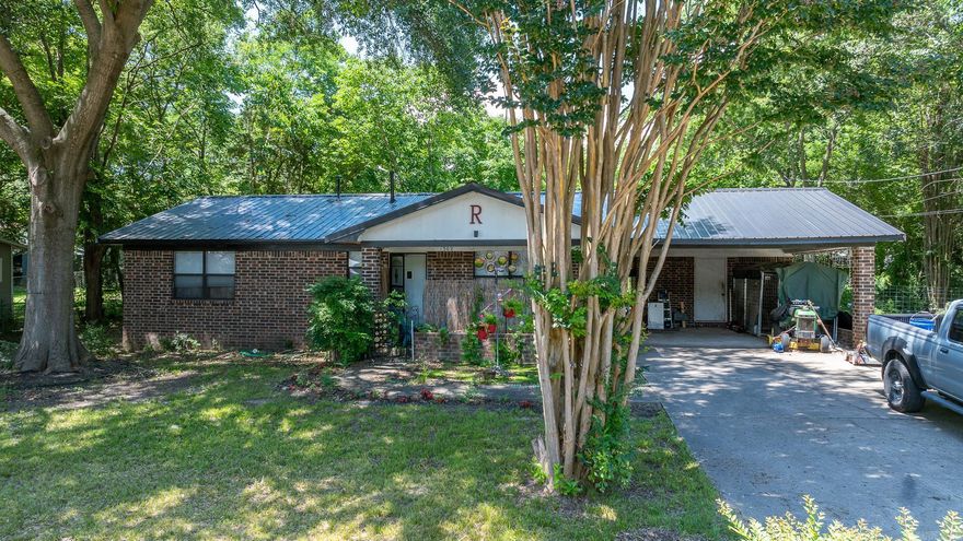 Come view this centrally located 3-bed, 2-bath brick rancher. This home is walking distance to City Park and the University of the Ozarks, featuring a new $15k metal roof, $7k worth of new appliances, and ample opportunity for cosmetic updates. Enjoy privacy with the home set back from the street, and a large backyard perfect for entertaining.