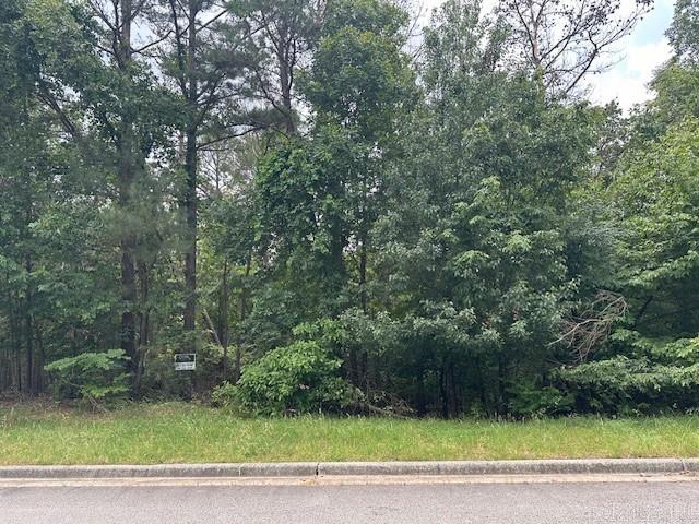 GREAT BUILDING SITE IN THE PREMIER GATED COMMUNITY OF HOT SPRINGS - RED OAK RIDGE . SITUATED ON 800 ACRES. ENJOY SERENITY AND PEACEFULNESS WITH LAKE AND MOUNTAIN VIEWS WITH SOME OF THE LOTS. PAVED WALKING PATHS ALONG THE LAKE FRONTS OF THE TWO PRIVATE RED OAK RIDGE SPRING FED LAKES - STOCKED WITH BASS FOR FISHING - ALONG WITH SMALL BOATING ACTIVITIES. ENJOY MOTHER NATURE AT ITS BEST! GREAT LOCATION CLOSE TO ACTIVITIES!!