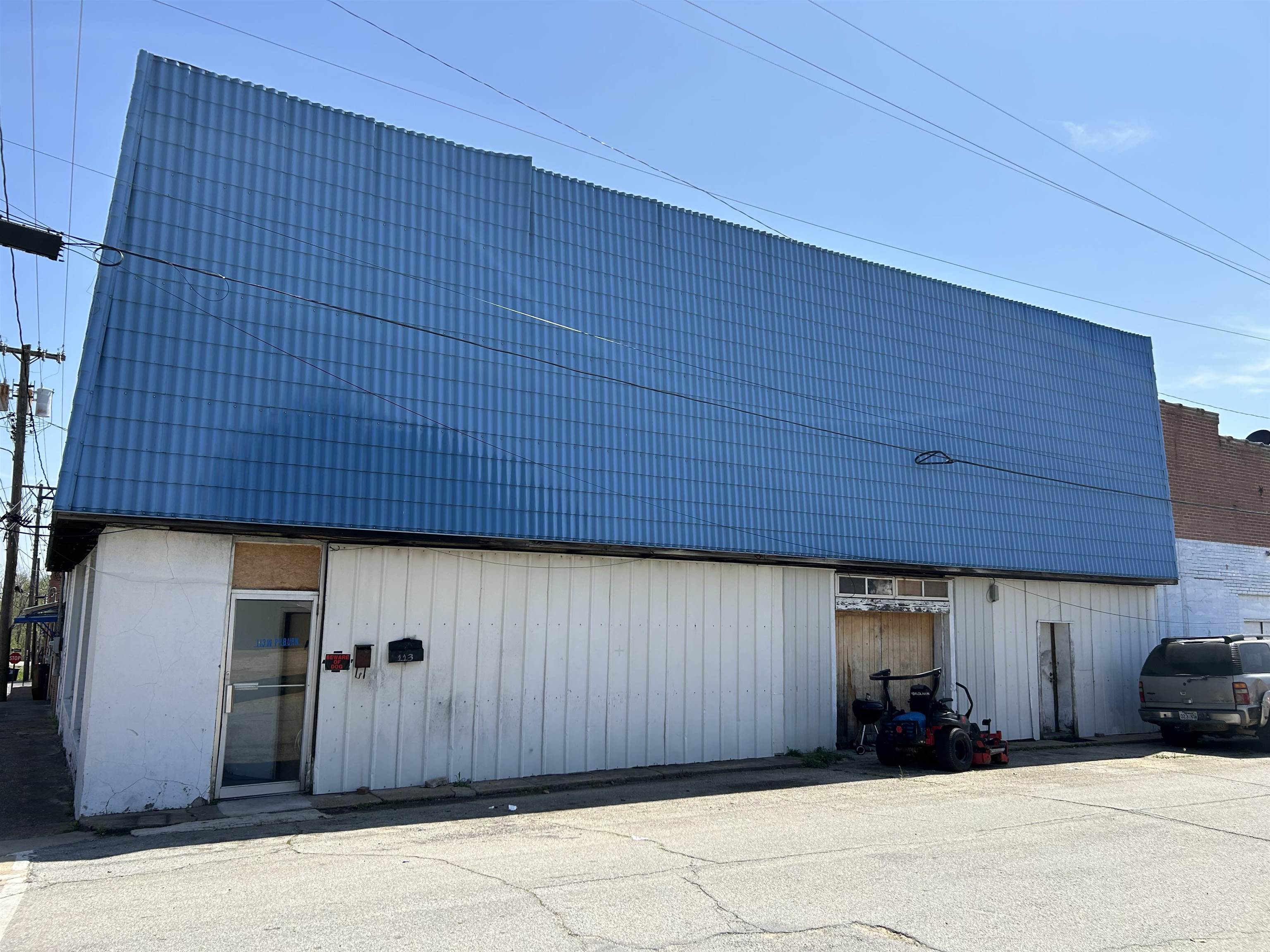 Prime opportunity to purchase a unique 6,000 sq. ft. commercial building that features four bedrooms and four bathrooms, including two one-bedroom, one-bathroom units and one two-bedroom, one-bathroom unit. This versatile space is ideal for a live-work setup or various business uses. With an open layout that can be customized to suit your needs, this property offers ample room for both professional and personal use. Located in a high-traffic area, it provides excellent visibility and accessibility for clients and customers. Don’t miss out on this chance to establish your business in a thriving community while enjoying the benefits of residential space!
