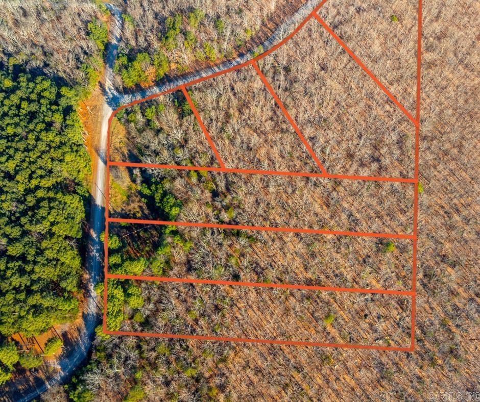 Private and Peaceful setting to build your forever home just minutes from Southside schools! The property is 9 +/- acres, Lots 71-77 located with minutes outside Southside in the popular Vista Pointe subdivision. This acreage offers ample space to create a secluded homesite shielded from neighbors or being seen from the road and surrounded by nature. The neighborhood's peaceful atmosphere makes it a perfect setting for a custom home that reflects your vision of rural living all while being just minutes from town. The land has some building requirements that are attached in documents. The plat of the subdivision is also in the attached documents. If you want to build in a well-cared-for and quiet area, this is the perfect place for you!