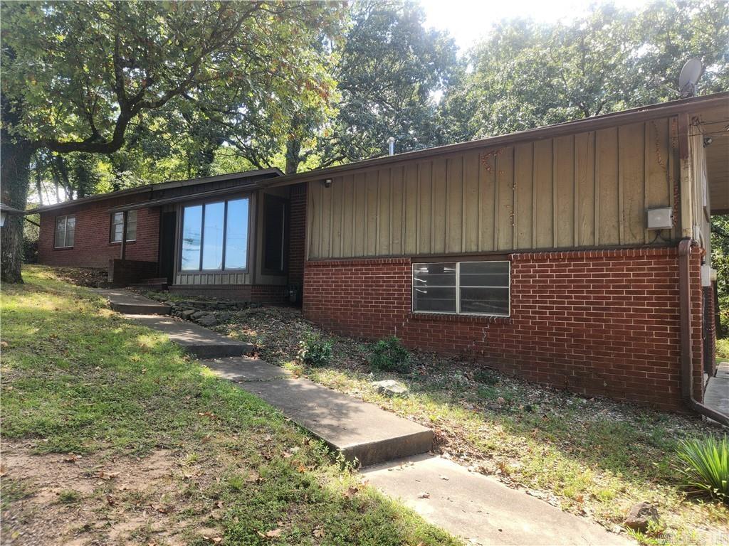 This home is both a great home and a bargain! Under $90 per sq. foot, with a great floor plan, lots of natural lighting with big windows, Nice kitchen with dining room, big family room with built ins and gas fireplace, huge bonus room or 4th bedroom, a big lot, lots of trees, paved drive and parking, double garage, come see this one! lots of room for personal touches, lots and lots of potential. Call today!