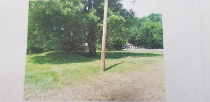 Nice level corner lot in Judsonia with utilities already in place. Storm shelter is also there. Only a few blocks from school, downtown area, city park, etc. May be approved for a DW mobile home but check with City of Judsonia to verify requirements. Single-wide mobiles are no longer allowed to be set-up in City of Judsonia. See agent remarks.