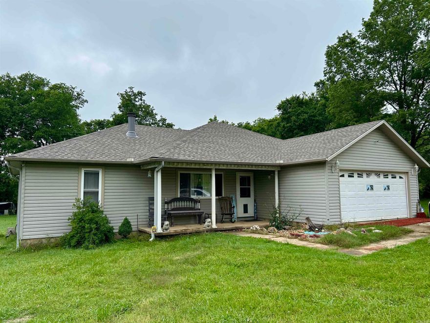 Welcome to 179 Darlin Lane—a home so charming, it truly lives up to its name. Nestled on a peaceful 1-acre lot, this 3-bedroom, 2-bathroom retreat offers the perfect balance of quiet country living with convenient access to nearby towns. Perfectly situated between Malvern, Bismarck, and Hot Springs, you’ll enjoy the best of all worlds: small-town charm, outdoor adventure, and access to shopping, dining, and medical services—all just a short drive away. Built in 2001, the home features a welcoming open layout, an attached garage, and a fireplace that adds a cozy touch to the living space. Whether you're sipping coffee on the back porch or heading out for a day at Lake DeGray or historic Hot Springs, this property is as endearing and well-located as its name suggests. Come experience the comfort and convenience of life on Darlin Lane!