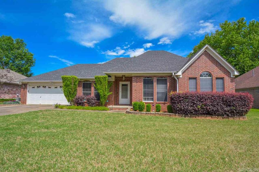 Longtime owner immaculate home, extremely well cared for. Spacious floorplan with split bedrooms. Big kitchen with lots of counter and cabinet space. Updated engineered wood floors, stainless appliances, no carpet. Beautiful custom tiled shower in master bath with dual sink vanities. Great storage everywhere, 10 x 12 custom workshop with benches and electricity, mature landscaping, fully privacy fenced, large stone back patio. New roof. Conveniently located in town to shopping, restaurants, and schools.