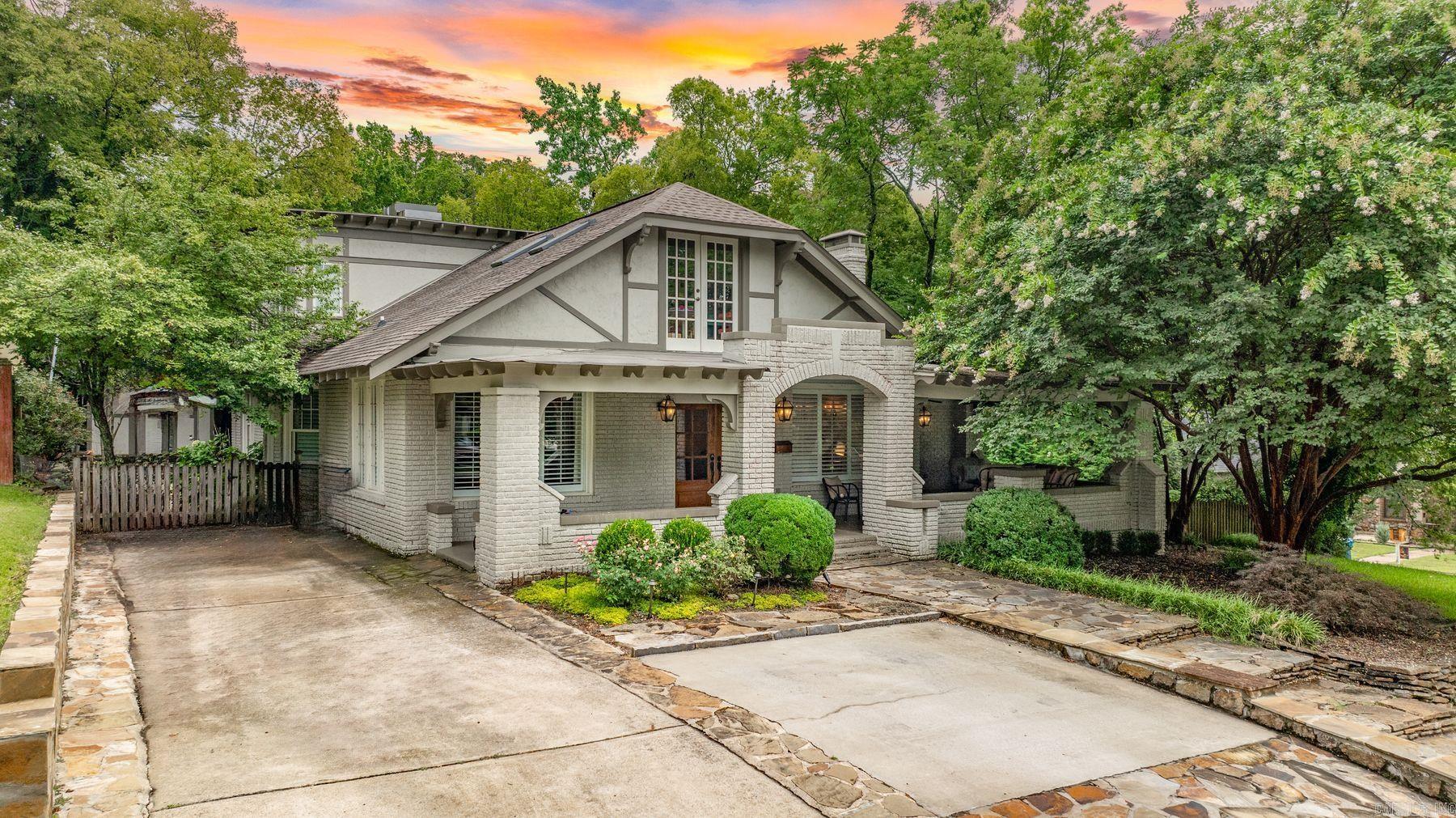 Discover timeless sophistication in this quintessential Hillcrest Craftsman home, meticulously updated to blend historic charm with modern comforts. In Little Rock's most walkable neighborhood, this residence offers a seamless fusion of spacious living areas perfect for comfortable living. The newly renovated kitchen serves as the heart of the home, featuring state-of-the-art appliances, custom cabinetry, and exquisite finishes. The adjoining dining and living areas create an inviting atmosphere, ideal for entertaining guests or relaxing. A sunroom bathed in natural light awaits, boasting an elegant breakfast room where mornings are savored.The refined home office provides the perfect retreat for productivity. Four bedrooms offer ample space for rest, including a luxurious primary suite with a private bath and spacious closets. A total of 2.5 baths ensure convenience and comfort. Outside, the alluring front porch punctuates the manicured yard that offers space for outdoor activities and gardening, complemented by the charming Craftsman-style facade that captures the essence of Hillcrest. This home is the main character in the book, "If These Walls Had Ears" by James Morgan.