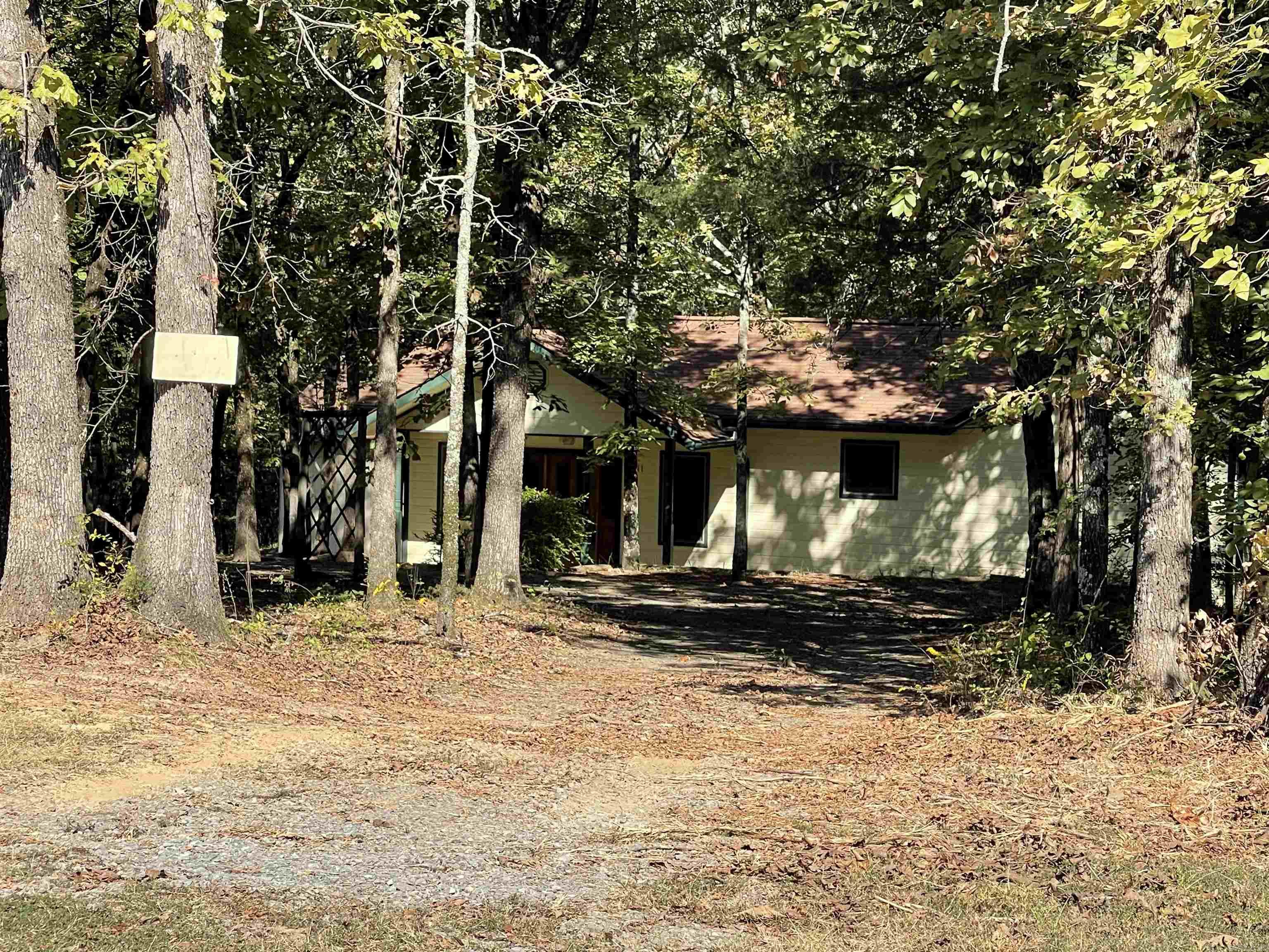 Charming single-level home nestled on 2.28 wooded acres. Built in 1995, this cozy residence features a bright open layout, easy access to Highway 65 for convenient commuting. With no HOA, enjoy the privacy of country living just minutes from town amenities. Ideal for first-time buyers, downsizers, or those seeking a peaceful retreat in Faulkner County. Schedule your showing today!
