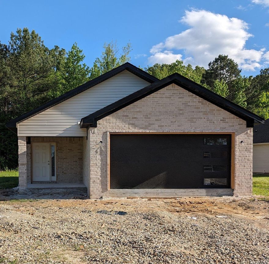 This beautiful new construction has an open concept. Perfect for entertaining! Stylish kitchen with granite counters and stainless steel appliances. Gorgeous tile and luxury vinyl flooring. Primary bedroom boasts custom storage in closet and private bath with walk-in shower. Home includes large yard, laundry/mud room, and 2-car garage. A must see!