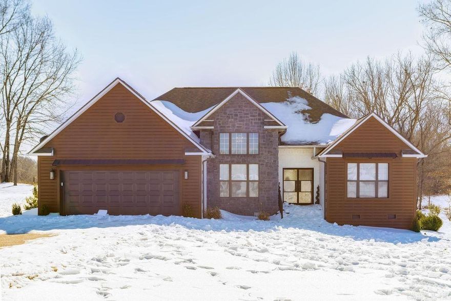 WELCOME HOME! From the moment you step inside, the impressive entry of this 4-bedroom, 2-bath makes a lasting impression. Conveniently located just minutes from Batesville, this property has already seen several recent updates, including new shingles installed in 2022. This home is a dream for anyone who loves to decorate and create a space that truly feels like their own. The spacious main living area offers hardwood flooring, trey ceilings, and a gas fireplace that anchors the room beautifully. The primary suite is tucked away for added privacy and features a walk-in closet along with a double vanity in the en-suite bath. Three additional bedrooms provide flexible space for guests, kids, or hobbies. Outside, a generous deck invites you to unwind on summer evenings or host friends and family with ease. This move-in-ready home is perfect for comfortable living and effortless entertaining.