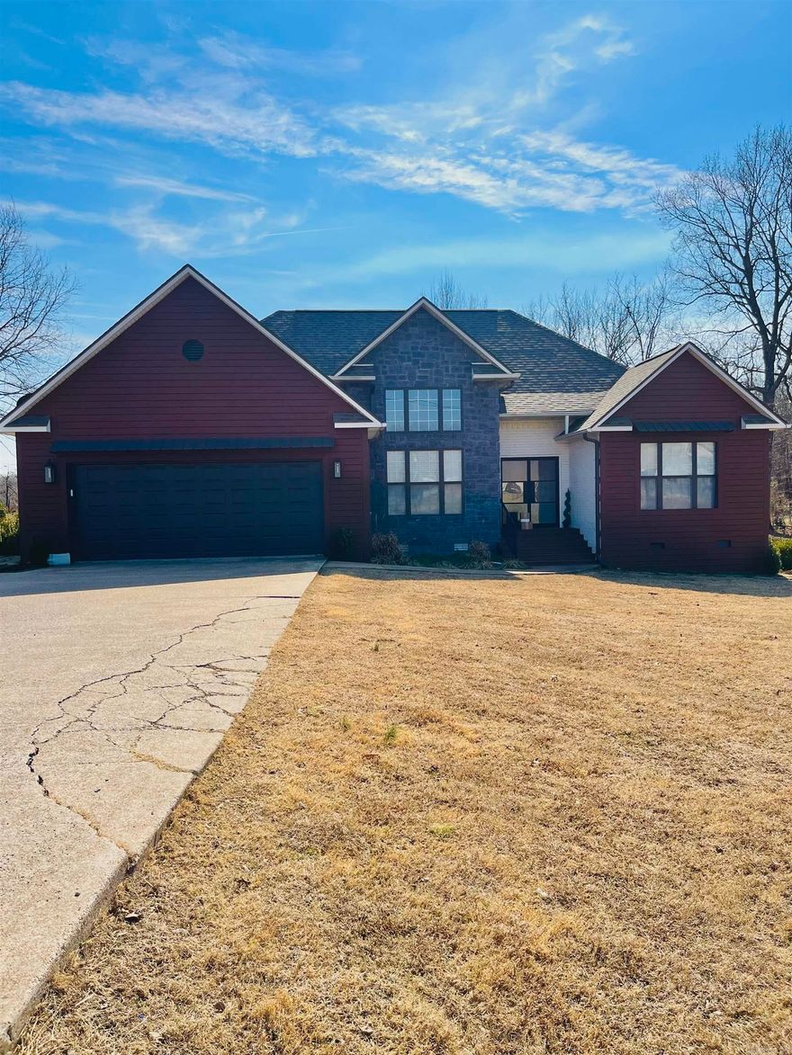 WELCOME HOME! From the moment you step inside, the impressive entry of this 4-bedroom, 2-bath makes a lasting impression. Conveniently located just minutes from Batesville, this property has already seen several recent updates, including new shingles installed in 2022. This home is a dream for anyone who loves to decorate and create a space that truly feels like their own. The spacious main living area offers hardwood flooring, trey ceilings, and a gas fireplace that anchors the room beautifully. The primary suite is tucked away for added privacy and features a walk-in closet along with a double vanity in the en-suite bath. Three additional bedrooms provide flexible space for guests, kids, or hobbies. Outside, a generous deck invites you to unwind on summer evenings or host friends and family with ease. This move-in-ready home is perfect for comfortable living and effortless entertaining.
