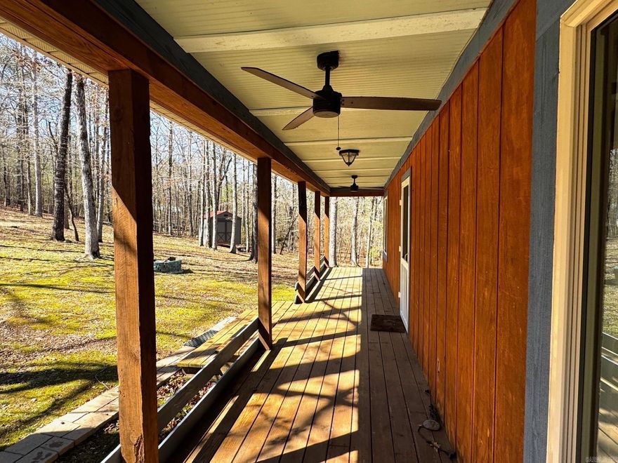 Tucked away just minutes from Lake Hamilton and Lake Ouachita, this charming one-owner cabin offers the perfect blend of privacy, simplicity, and opportunity. Built in 2013, the 1 bed, 1 bath home welcomes you with a cozy, inviting feel—ideal for weekend getaways or peaceful full-time living. Set on five spacious lots, the property provides plenty of room to roam, relax, and expand. An additional storage building adds convenience for all your lake gear, tools, or hobbies, making it easy to enjoy everything this area has to offer. With three septic systems already in place, the possibilities here are wide open—whether you’re dreaming of adding guest spaces, creating a family retreat, or simply enjoying the extra space and flexibility. This is more than just a cabin—it’s a place to slow down, spread out, and make it your own.