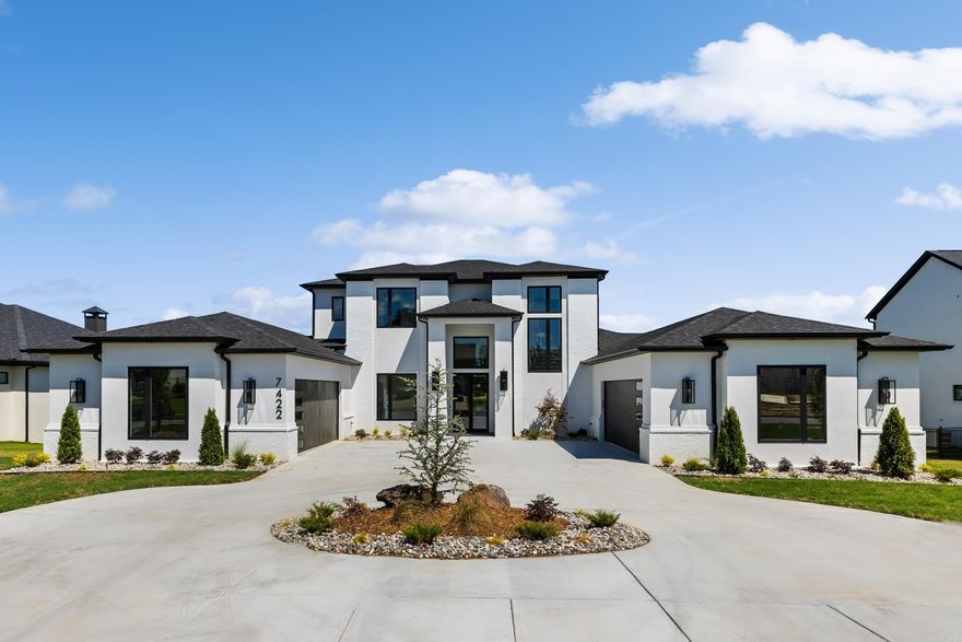 Stunning New Construction expertly crafted by Hill Development and Design. This modern masterpiece features gorgeous lake views at every turn. The 2 story entry with glass stairwell opens to spacious living room with linear fireplace and hardwood floors. Chef's kitchen with floor to ceiling cabinets, waterfall island, premier Thermaador appliance package (Built in side by side fridge, gas range, double oven, separate ice maker, wine fridge), and drop down ceiling in breakfast area.  2 primary suites on main level, with the largest one featuring a breathtaking bathroom with spacious custom tile shower, free standing tub, massive walk-in closet, and gorgeous chandeliers.  Bonus room upstairs opens to covered balcony overlooking the lake. All bedrooms feature ensuite bathrooms with custom tile showers. The premire lighting throughout will blow you away! So many extras including 4 car garage, sprinkler system, Andersen windows and doors, and gas plumbed to back porch. Truly amazing! (More photos to come after completion)