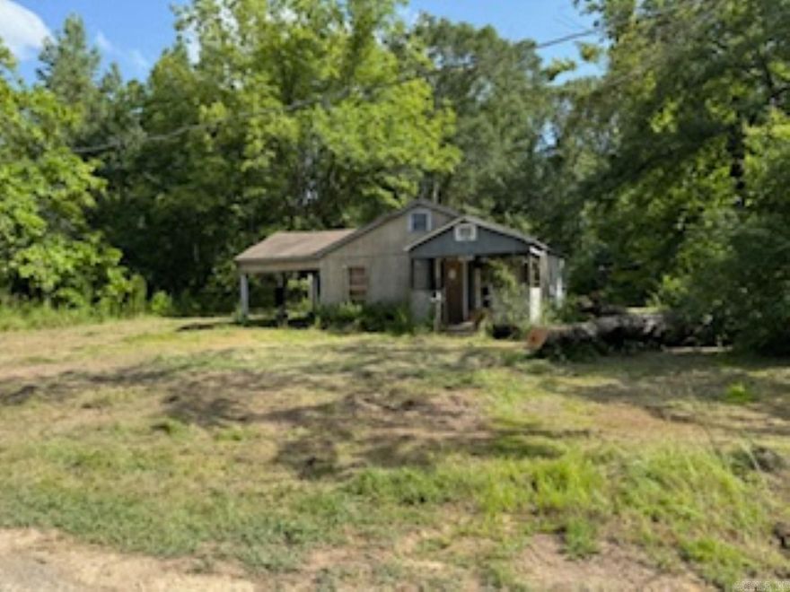 Investment property of a fix upper just for you! The lot is worth $25,000 that has city sewer, lights, gas, water, and internet availability. Agent owned.