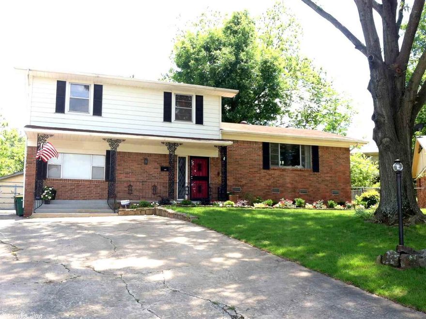 Tons of space for the entire family! 4 bedrooms, 3.5 bathrooms with tons of living space for relaxing and entertaining. 2 master suites, one upstairs and one down. Light and bright formal living room and a large cozy den with fireplace. Updated kitchen with stainless steel appliances and granite counter tops. Screened porch with vaulted ceilings and room for a large table makes the perfect outdoor space to host a relaxing dinner or cookout. Agents see remarks.