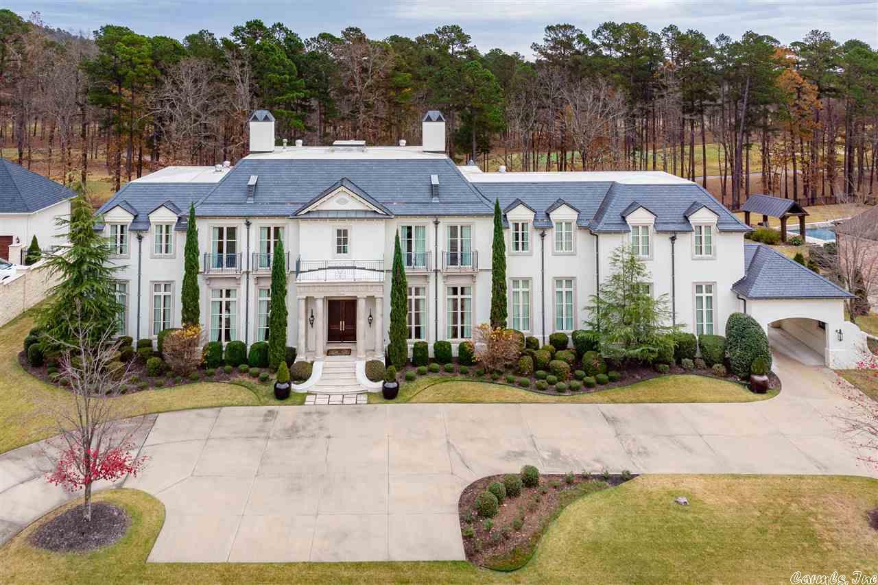 Custom Jack Hartsell built home on signature hole of Bear Den golf course. Dramatic 2 story foyer. Beautiful staircase. Floor to ceiling windows. Gourmet kitchen - Viking appliances, Marble floors, Granite counters. Master on main level. 4 large BR suites up, 2 balconies. Wine cellar. Bonus room plus theatre room. Spa-like baths, elegant dining/sitting rooms. 6"oak plank floors. Salt/heated pool w/shower, outdoor kitchen. 4 car garage. Slate roof. See Docs for complete features. Luxury living at its finest!