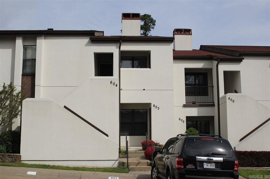 Beautiful condo with open floor plan. Gorgeous new flooring throughout with tile in wet areas. Vaulted ceiling in great room and dining room.Great room leads to outside deck overlooking beautiful lush view. Granite counter tops in kitchen and baths. Stainless steel appliances. POA dues cover water, management fee, exterior insurance, termite, sewer and trash pick-up, swimming pool maintenance, maintenance of grounds and common areas. Don't miss this one!