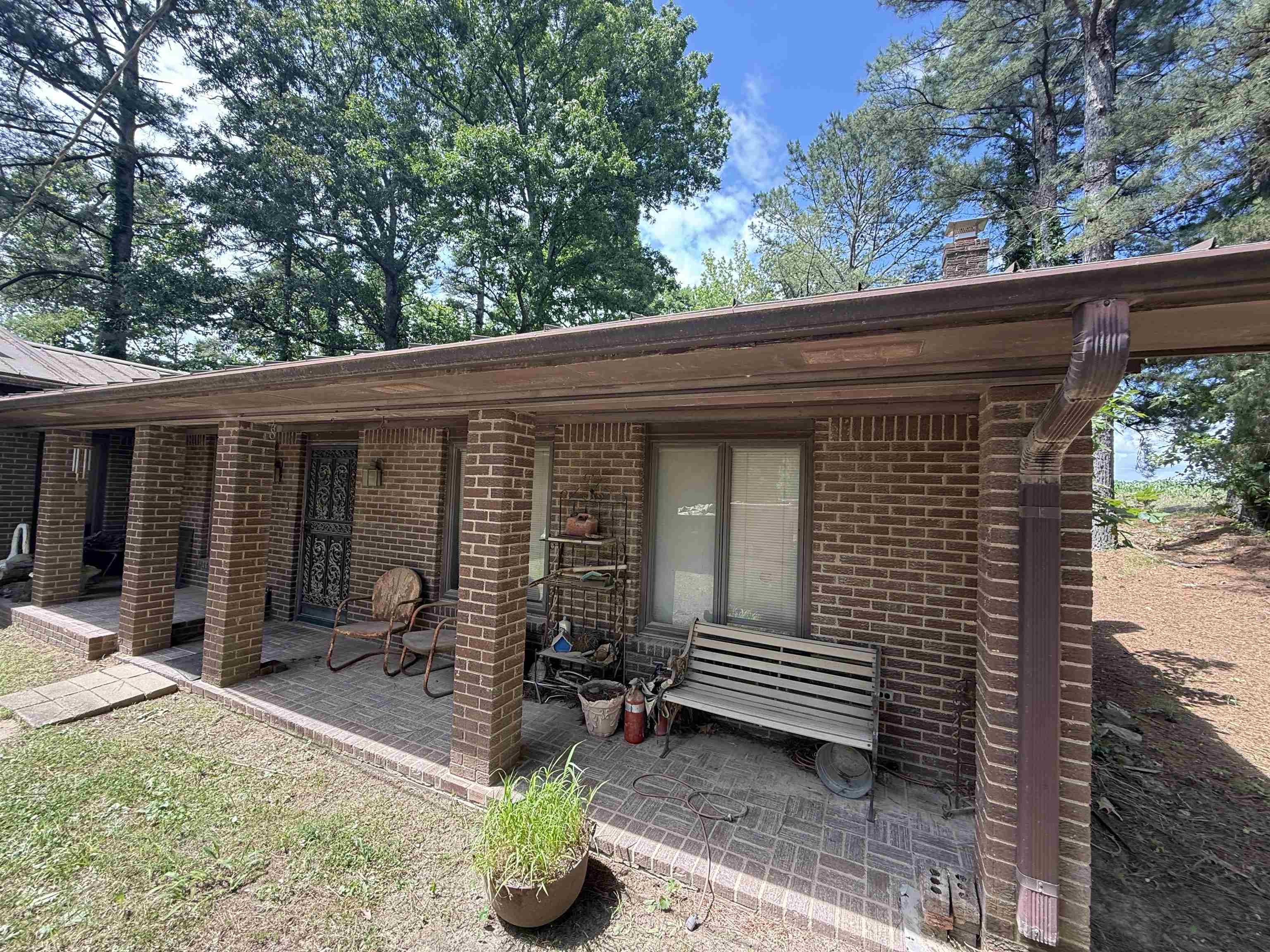 Three bedroom brick home sold as is, auction for contents will be done by Phillips auctioneers. Metal roof, home built in 1960 approx. and is part of an estate sale of property.