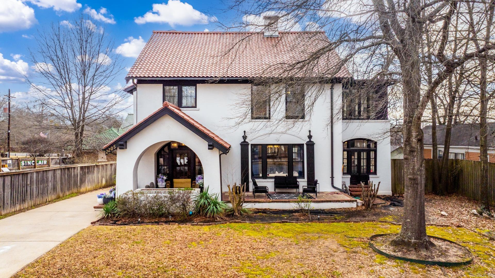 Historic 1925 Safferstone home brimming with charm, craftsmanship, and thoughtful modern updates. Gorgeous woodwork and flooring throughout. The remodeled kitchen features quartz countertops, stainless steel appliances, a 5-burner gas range, white cabinetry, and a butler's pantry. The primary bedroom boasts an amazing custom closet, while the finished attic offers a full guest suite. Abundant windows invite natural light into every room. Enjoy outdoor living with a covered deck and fenced backyard, perfect for entertaining. The completely updated 1,000+ sq ft carriage house includes living, kitchen, and bedroom spacesāan ideal guest suite or rental opportunity (not included in main square footage). Exceptional architecture paired with warm, inviting ambiance makes this a rare find.