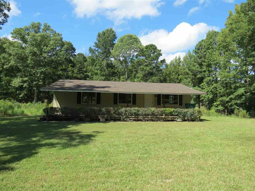 Great location in Redfield.  Mobile home sits on 10 beautiful acres, inside the city limits.  This doublewide has 3 bedrooms and 1 1/2 baths, covered front porch and covered back porch.  This home awaits your personal touches.