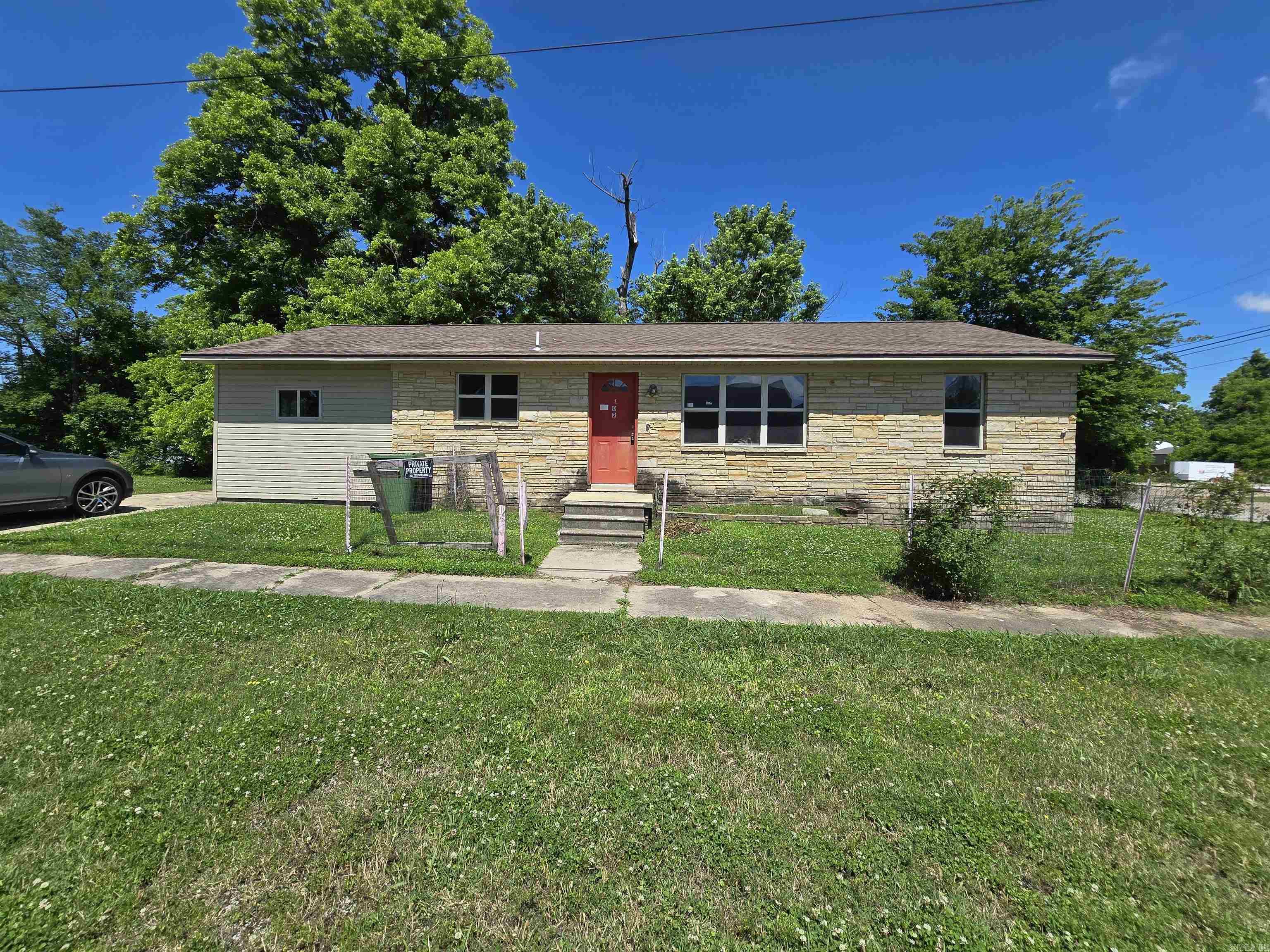 REO Property with curb appeal but needs serious indoor TLC! Spacious open-plan living, kitchen & dining area, 2 bedrooms, 1 bath and linen/coat closet down the hall. Compact laundry room off the kitchen, another bath with vanity, toilet & shower-stall, plus a step-down enclosed carport—perfect for a 2nd living space, office, or 3rd bedroom (with exterior door)! Nice lot with a small backyard & plenty of side space. ***Appliances and H/C systems that are listed are not guaranteed or warranted to work. AS-IS purchase only.