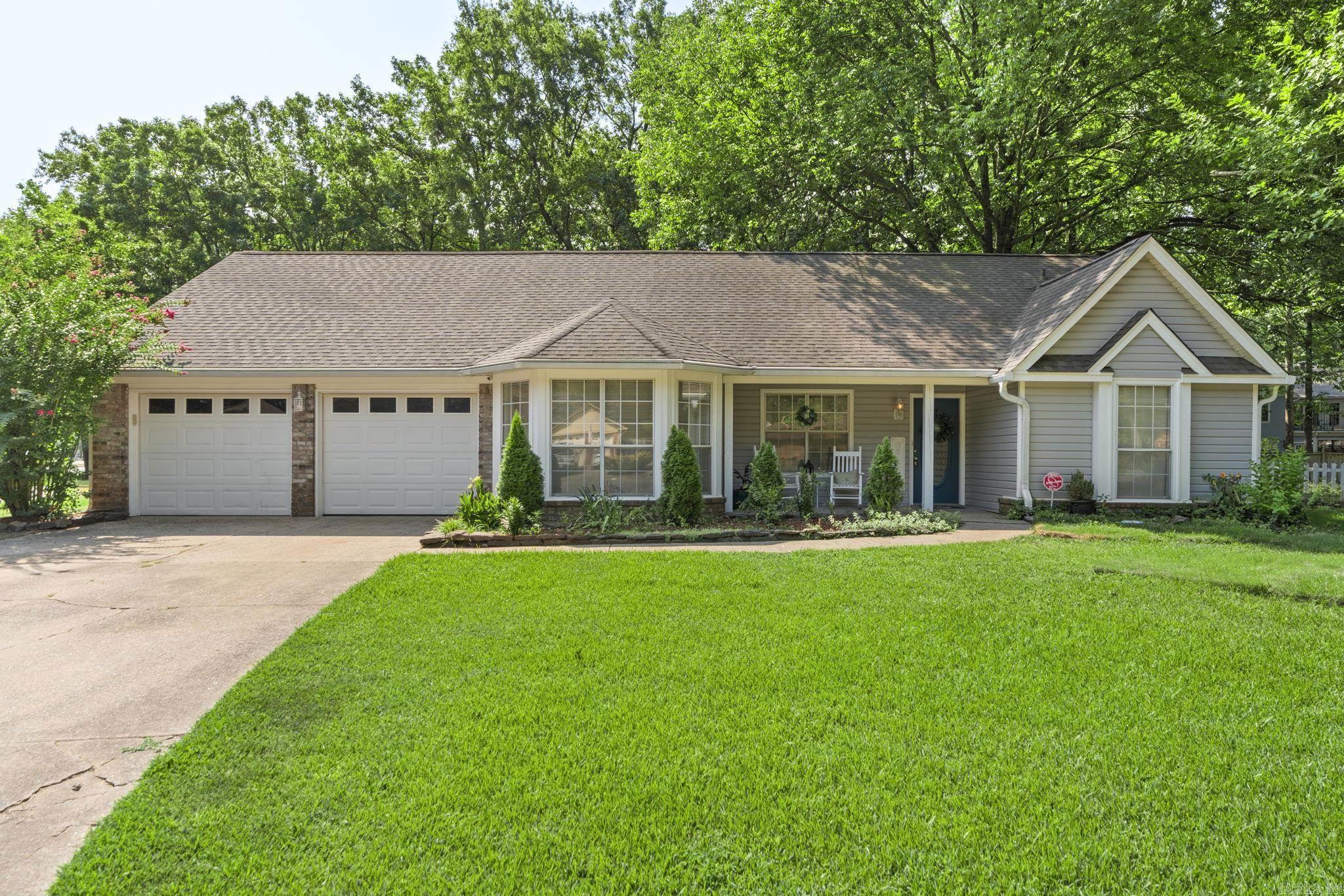 Charming Home nestled in the heart of Maumelle within easy reach of the cityās amenities,2 golf courses. This 3BR/2bath/bonus room +sunroom and detached building is a stunning home that boasts a harmonious blend of classic architecture and contemporary upgrades. Neutral tones create a warm, welcoming vibe, ample storage throughout, including linen and coat closet. kitchen is outfitted with stainless steel appliances with an adjoining breakfast nook with bay windows is perfect for enjoying your morning coffee or meal .Master BR a peaceful retreat with walk in closet ,bathroom double vanity with sitting area. Split 2BR share full bath. The heart of the home is a spacious living room with vaulted ceilings, new laminate hardwood floors, a gas fireplace with and French doors leading into the sunroom. Sunroom opens to pavers leading to a firepit/sitting area for entertaining. The storage building +lights/ electricity for any hobby. The backyard is a true oasis ideal for outdoor dining and summer gatherings, for children to play, and ample green space for pets or gardening. enthusiasts. New HVAC (2023), Roof replaced (2019), all new carpet, paint, fixtures. MUST SEE! See agent remarks
