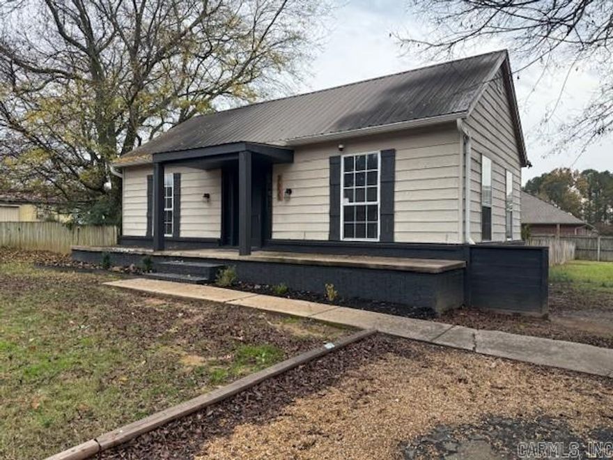 Highly desired priced home in West Conway across from Conway Country Club, possible multi-family development.  880 sq ft home, .45 acre large fenced lot, large rear deck, 2 bedroom 1 bath with a bonus room that was used as a bedroom.  Metal roof, newer HVAC.  Very rare to find a home at this price in West Conway! AS IS, no repairs by seller