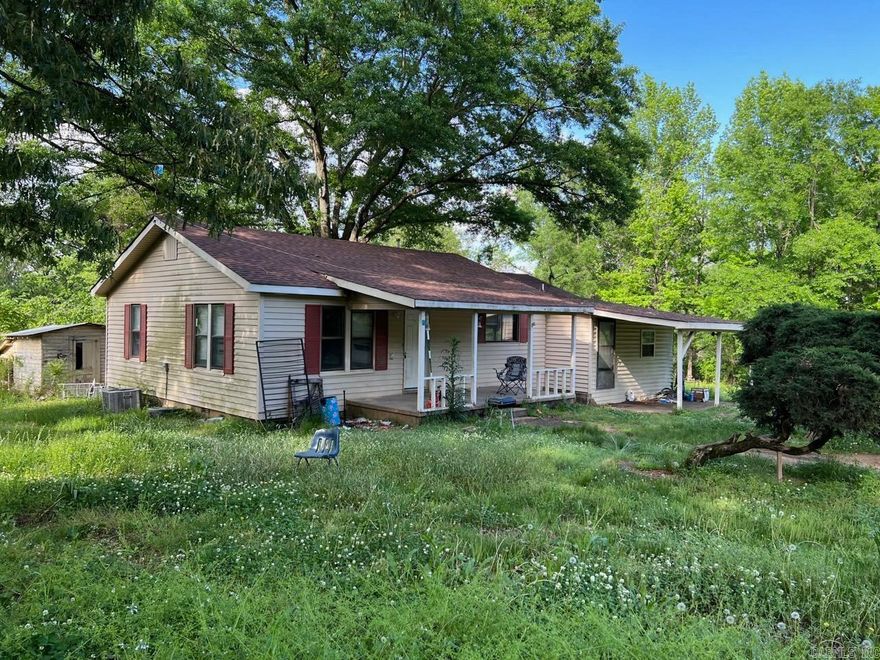 Four Bedroom Two Bath house on one acre of land.  House has a good roof and good Heat/Ac system.  Needs Cosmetics   Conventional Loan or Cash only