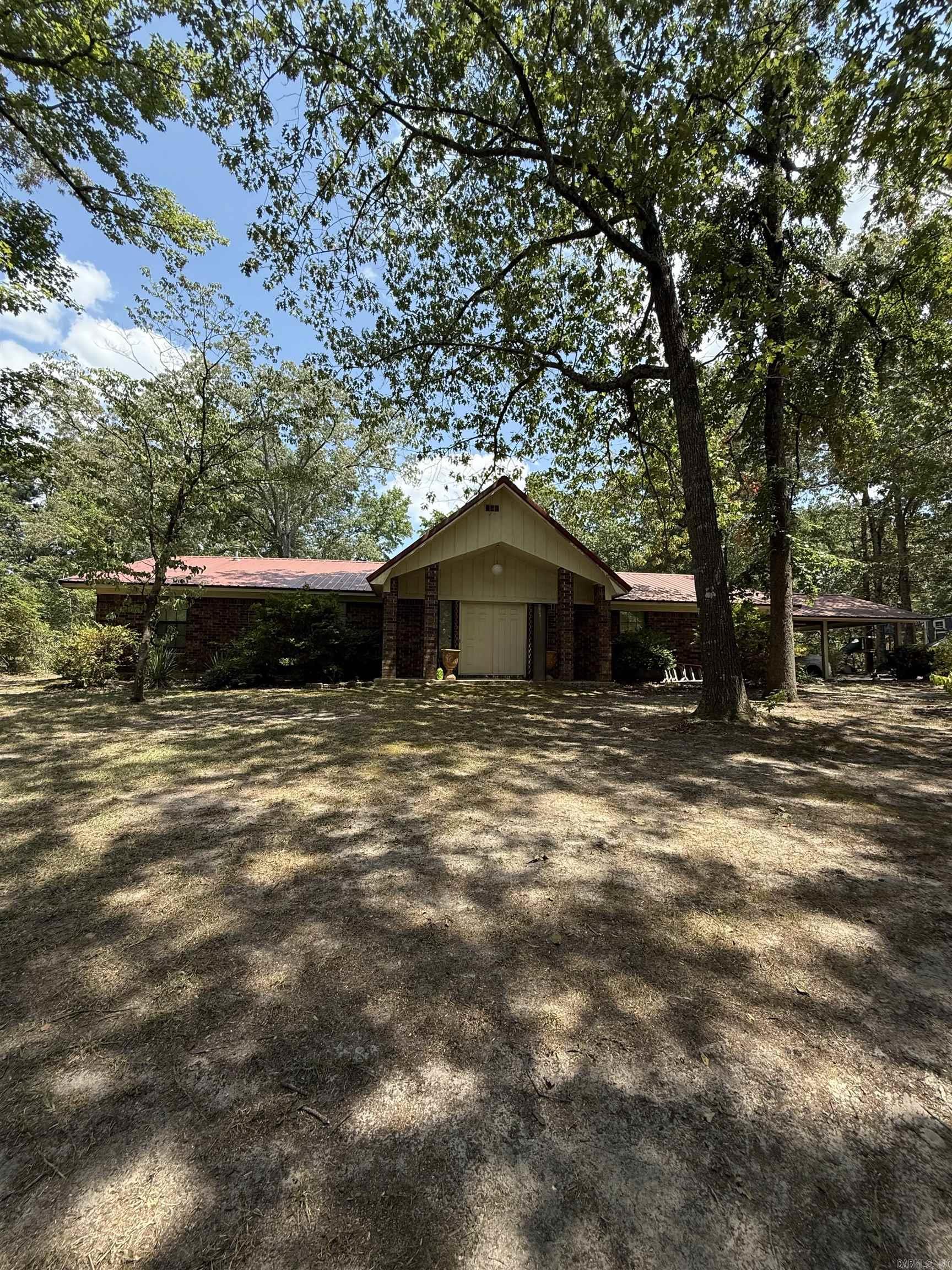 āDiscover your own private retreat in the heart of White Hall! This spacious 4 bedroom, 3 bath ranch-style home is perfectly nestled on 2.44 wooded acres, offering both privacy and convenience. The property features a large playground, and storage buildingāboth equipped with electricityāand a beautiful wooded lot that creates a serene, secluded feel. Inside, youāll love the inviting living room with vaulted ceilings and a cozy brick fireplace. The dining room boasts a unique circular staircase leading to a charming loft, perfect for a reading nook, office, or play space. Whether youāre hosting family gatherings or simply relaxing on your peaceful property, this home has it all. Fenced in backyard. Located just minutes from shopping, dining, and easy access to I-530, you can enjoy the best of country living without sacrificing convenience. A rare find with space, character, and locationāthis one wonāt last long!ā