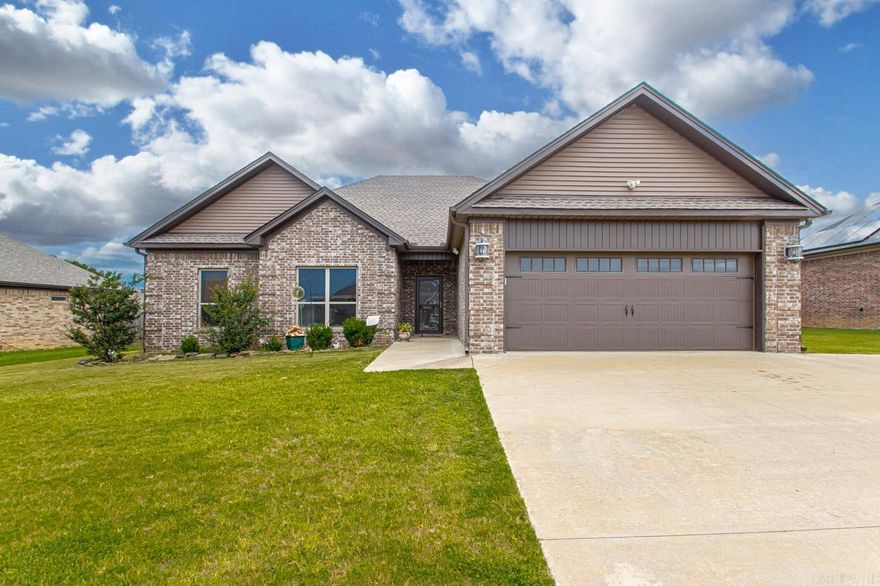 This newer four bedroom two bath home is located in the desirable Shadow Creek subdivision in the Cabot School District. Appealing inside and out the open floor plan enhances the sense of space and flow between rooms. Eat in kitchen with able countertop space for dining at the breakfast bar or dining table. Granite countertops and farmhouse sink are just a few of the charming features. Fully fenced backyard with a dog run is ready for family fun and entertaining under the covered patio. This home combines modern amenities with a functional design.