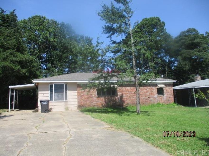 property has a living room, a den, eat in kitchen,  laundry room, and nice back porch and fenced backyard.