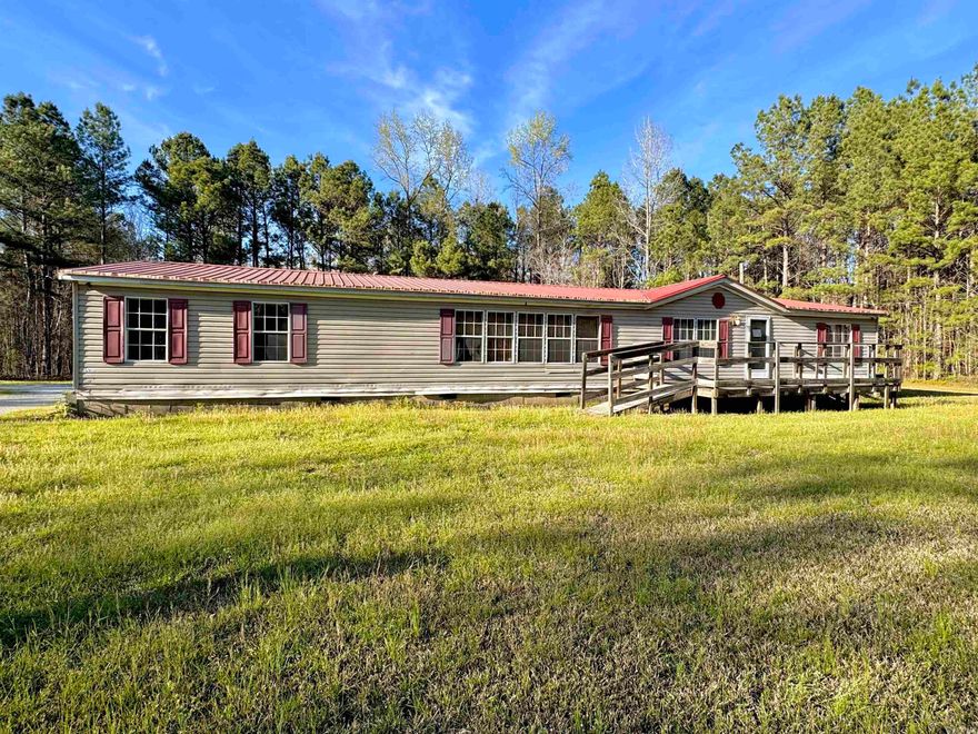 ***Seller Offering a Flooring Allowance with acceptable offer, to replace carpet with new carpet or with laminate wood flooring!****  Here's your chance at an investment deal of the year! Come and build a whole entire compound, build for revenue, or live and enjoy the spacious land! Inside is a 4 bed/3 ba home, approximately 2560 sqft that boasts of 2 living areas, a large kitchen with dining area, a colossal size Master bedroom that comes with an adjoining BONUS ROOM that could be used as a man cave, woman cave, library, media/movie room, or personal office. The master bathroom has a tub and walk in shower and double vanity. Split floorplan created for privacy with 3 other bedrooms on the opposite side with 2 extra bathrooms. Sold as is. Agents see remarks.