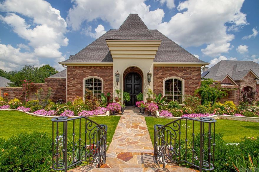 Gorgeous home in West Pointe subdivision on a corner lot with exquisite landscaping, sprinkler system,  offering 5 bedrooms and 4.5 baths, brick and stucco exterior, gourmet kitchen, wet bar, in-law quarters/secondary master, hardwood floors, new paint, new cabinetry, new sunroom, primary suite that dreams are made of,  tankless water heater, ice maker, beautiful in-ground pool with waterfall and so much more!