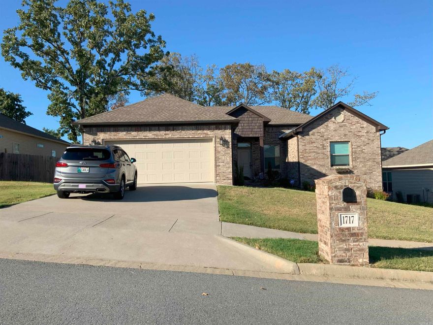 Open Floor plan, large kitchen with white cabinets, pantry granite countertops and tile backsplash. split bedroom floor plan, very nice master with a soaking tub, separate shower and a large closet.  Seller has added new tile flooring except the guest bedrooms.  Partially covered deck, privacy fenced backyard.