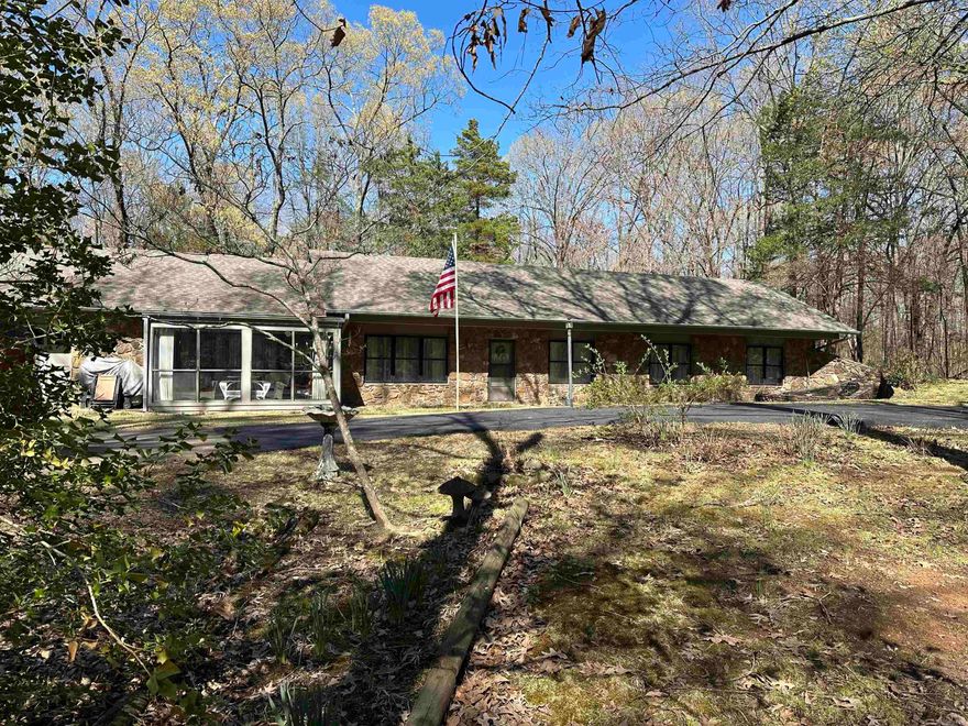 Peaceful Living on 2.5 Acres!  This beautiful one-owner home offers over 2,300 square feet of well-maintained living space, perfectly situated on 2.5 serene acres.  3 spacious bedrooms, large den open to the dining area - perfect for gatherings.  Separate formal dining room for special occasions, meticulously cared for and in excellent condition.  Enjoy the privacy of country-style living with plenty of room to relax, entertain and unwind.