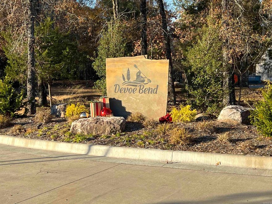 Don't miss this rare opportunity to own a spacious 0.38-acre waterfront lot, perfect to build your dream home in Devoe Bend Subdivision! Devoe Bend subbivision is a thoughtfully designed, low-impact community featuring 48 lots nestled along the scenic White Oak Bayou in Maumelle. This development boasts a private entrance, spacious lots, and a variety of amenities, including two kayak and canoe launches, a camping area, two ponds, and nature trails that wind throughout the property.