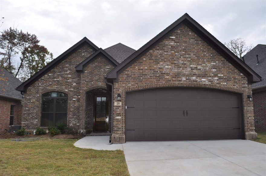 Luxury Patio home built by Eric Ward, many extras. All brick, hardwood floors, open floor plan with kitchen den combo. Great room with cozy fireplace, tray ceiling. Bathrooms & kitchen- granite counter tops. Kitchen has stainless steel appliances, gas cook top, island sink & breakfast bar, custom cabinetry. Spacious Master suite is split from 2 other bedrooms. Bonus room. Large covered back porch. Great location!!!