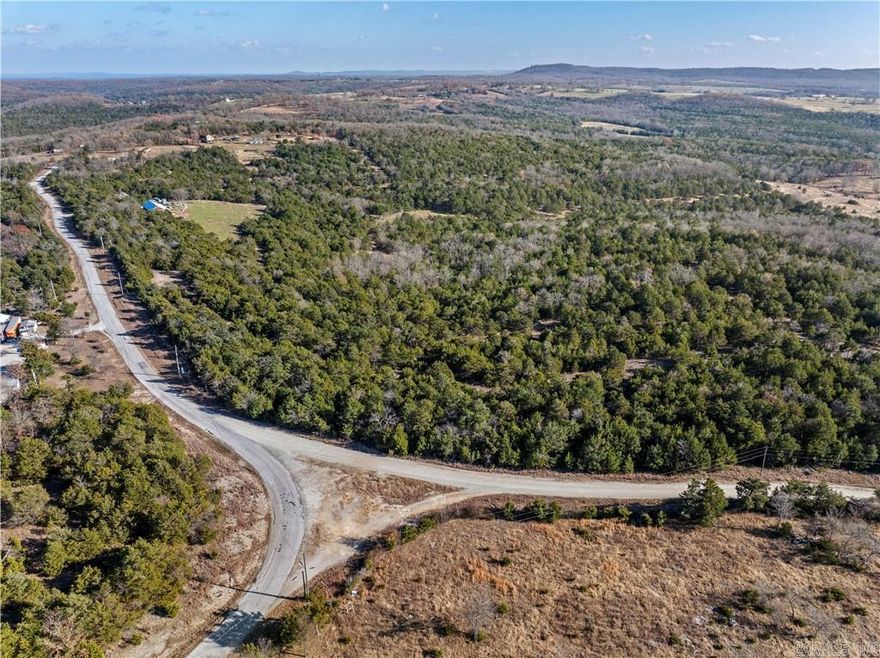 Discover the perfect spot to build your dream retreat or getaway on this serene 5.54-acre wooded property, located just minutes from the sparkling waters of Bull Shoals Lake. Enjoy the privacy of a wooded setting with the convenience of a great location close to lake activities. This property offers a peaceful atmosphere and endless potential. Don't miss this incredible opportunity!