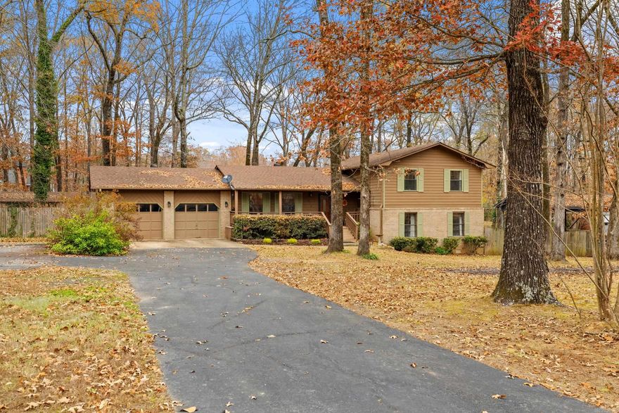 Set on 1.5 acres in a quiet, wooded setting, this spacious 4-bedroom, 2.5-bath home offers privacy, comfort, and room to breathe. The fully finished walk-out basement provides 355 sqft of flexible living space, ideal for a bonus room, home office, or guest retreat (not included in overall square footage) The home features central heating and cooling, with an energy-efficient pellet stove as an added option for supplemental warmth and efficiency. Outside, enjoy a fully fenced backyard with additional chain-link fencing. Perfect for pets, play, or entertaining, along with a private hot tub for relaxing year-round. Offering generous indoor and outdoor space in a peaceful setting, this home blends rural charm with everyday functionality. A must-see property with plenty of room to make it your own.