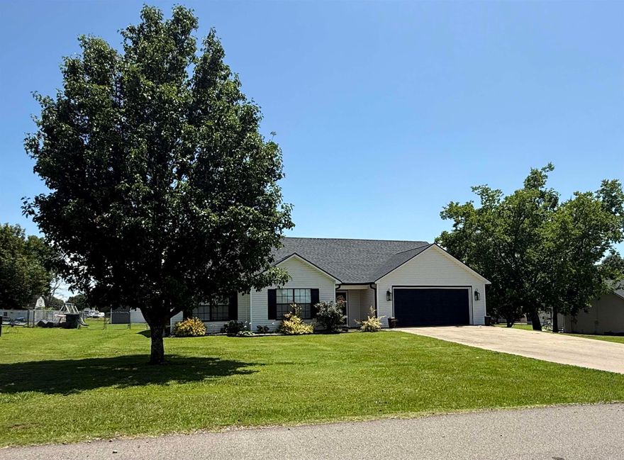 Stunning Home with Spacious Layout - 2914 Hatties Ln, Ozark, AR     Check out this gorgeous newly updated home featuring a spacious and open floor plan; located off Highway 64 close to Altus, in Ozark, Arkansas. This home offers 4 bedrooms plus an office/playroom/etc. and is perfect for both work and relaxation. Two of the bedrooms are master suites, each with its own bathroom and ample space and privacy.  The heart of the home is its large open floor plan and beautiful kitchen, which includes conveying top-of-the-line KitchenAid appliances. You'll appreciate the large walk-in pantry for all your storage needs, the convenience of walk-in closets, and a large laundry room to make everyday tasks easier. The large backyard is perfect for outdoor entertaining, and it comes with a shop for all your DIY projects and storage needs.  With plenty of square footage, there is plenty of room to spread out and make this home your own. This beautiful home also includes beautiful crown molding and new baseboards. It also has been recently updated with new light fixtures, ceiling fans, and bathroom fixtures/mirrors.   Don't miss the chance to see this gorgeous home! Schedule a tour today!