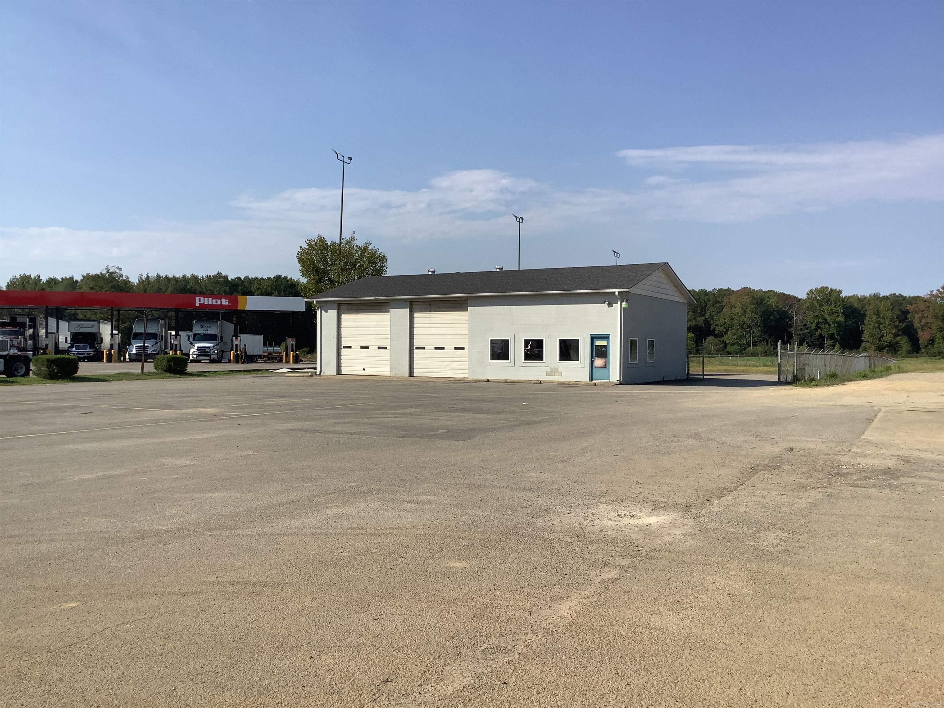 The garage is located at Exit 55 of INTERSTATE 57 (I57). It puts this property at a perfect location for travelers going through North Central Arkansas, Missouri, and Tennessee. This 4800 sqft building has 3 bays. The large back bay is used for Semi-truck repair and service. The garage is located beside the Pilot Truck Stop, so a garage would be great for those over-the-road truck drivers and other motorists needing help.