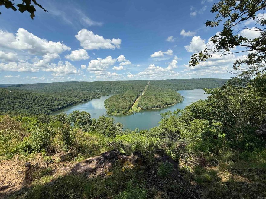 Amazing Views of Middle Fork on Greers Ferry Lake!  See survey online under docs. Long Lot where you can tuck your home back off of the road and on the back side of the property that overlooks the lake.  Lot 2 of Watersedge Estates Ph. I.  (See covenants attached under "Docs").  Subdivision Lake Access (walking access, not a boat ramp) at the bottom of Lower Ridge Circle & ATV trails close by in Fairfield Bay.  Fiberoptic Internet available at the road through "Connect2First" .