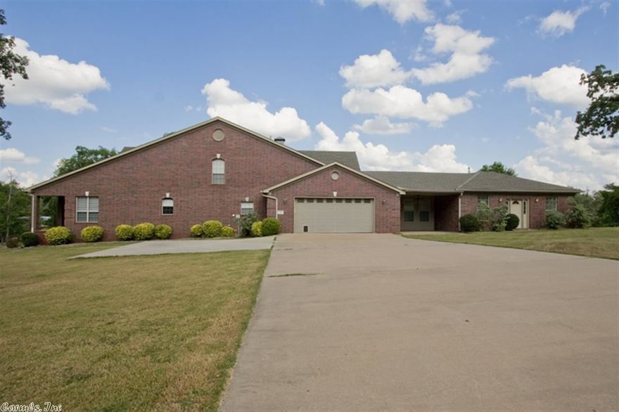 This house is beautiful with 8000 sq ft of home & shop. Home has open floor plan. All bedrooms have bath attached. Formal dining, large great room and  play room. The shop has living quarters and 3 offices. This is a great set up for extended family or business. Sits on 4 acres.