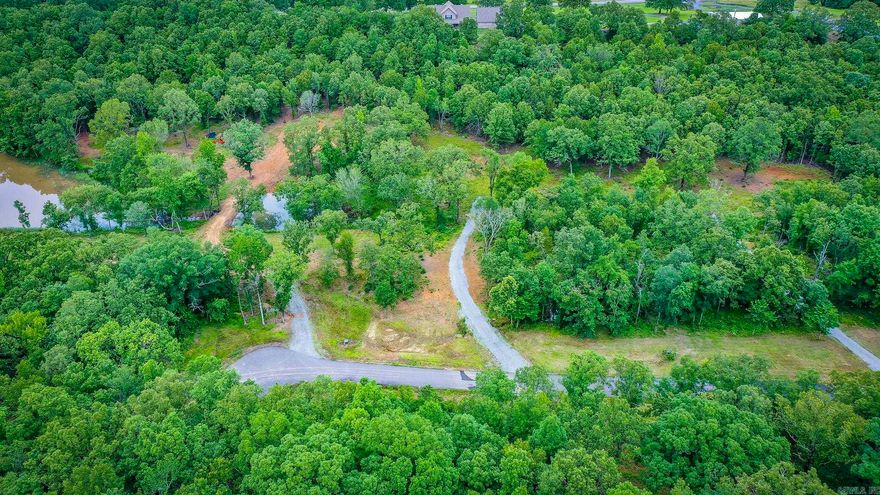 One of the last flat lots left in Mountain Ranch Estates. This one has utilities at road and driveways already in! Ready to build your dream home in this gated subdivision just minutes from town. Over two acres to enjoy. Can be purchased with lot 103 for over 4.5 acres!