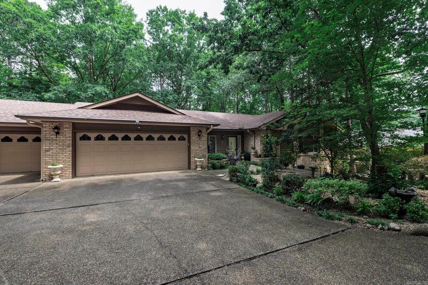 Villa Alegre Townhome wonderfully located on Burladero Trace. This open plan features a great room with a vaulted ceiling, oak hardwood floors, wood burning fireplace and wet bar for all your entertaining needs. Abundant oak cabinets and granite counters with a matching breakfast table. Large walk in pantry and separate laundry room. Separate dining room with tray ceiling open to great room and kitchen. Primary suite with generous closets in the bedroom. Enjoy living on one level with an added bonus of approximately 460 square feet of finished area in the lower level with three day beds and covers which convey, additional bathroom and small refrigerator. Game area with small freezer and additional storage area for all your hobbies. Both covered and uncovered deck on the back of unit for enjoying all the beauty the Village has to offer.  Duplex style townhome is conveniently located to the West Gate shopping area and DeSoto Club for dining.  Drive your golf cart to the pro shop for golfing or access the wonderful trails for walking. Gorgeous landscaping with timed sprinkler system in front yard. Roof 2024, HVAC 2022. Make sure this one makes your must see list! AGENT REMARKS